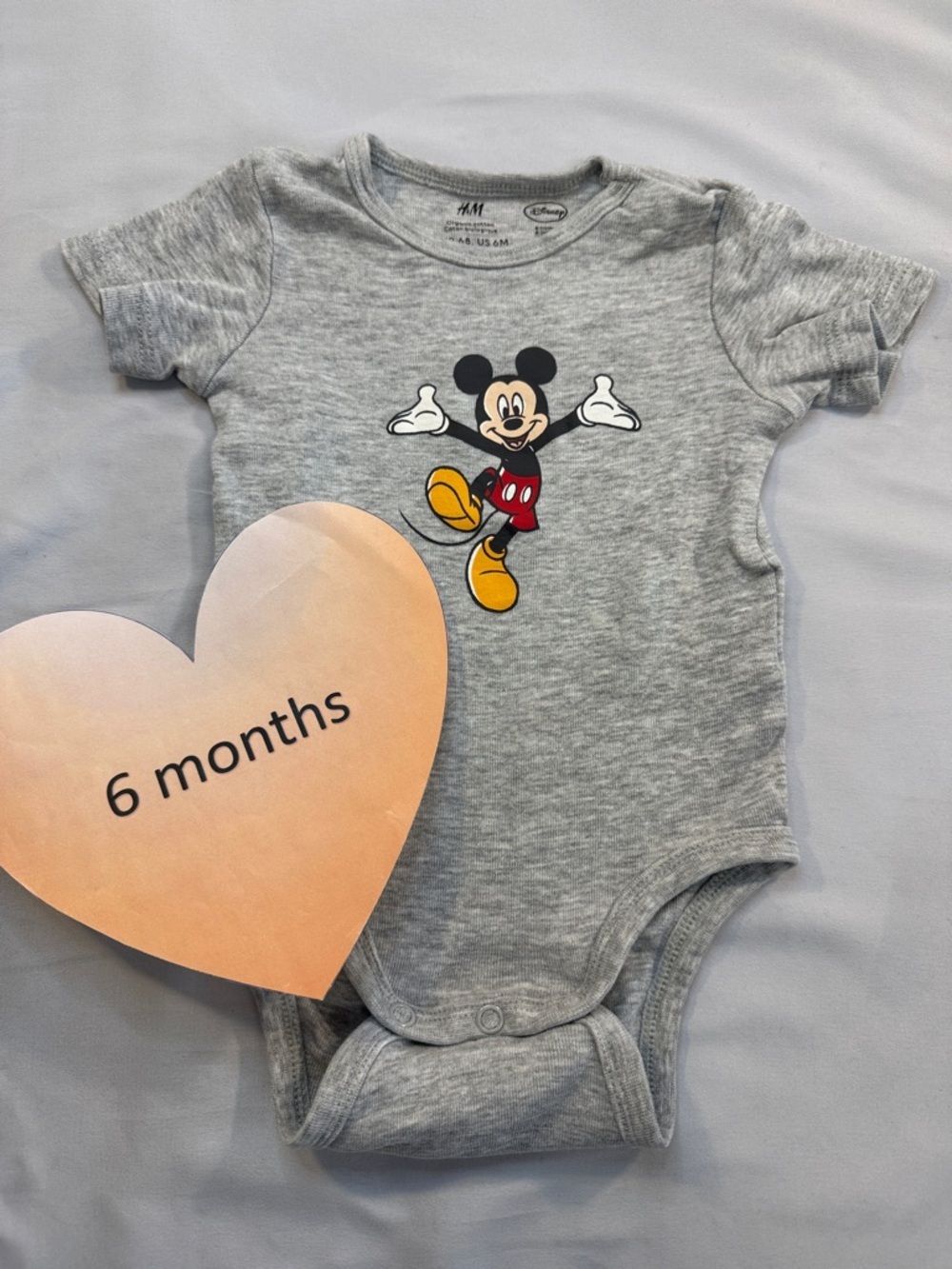 Disney Grey Mickey Mouse Graphic Baby onesie